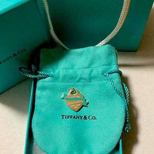 Tiffany & Co. blue ribbon heart tag charm